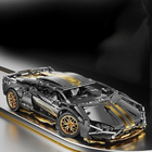 Конструктор сіро-золотий Lamborghini 1:14 – рульовий механізм, диференціал