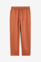 Жіночі штани H&M 203760-1 L(175/88) світло-коричневий 2037600005