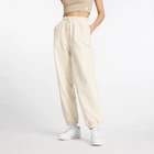 Женские бежевые спортивные брюки New Balance NB Athletics 36 (S) (WP41513LIN)